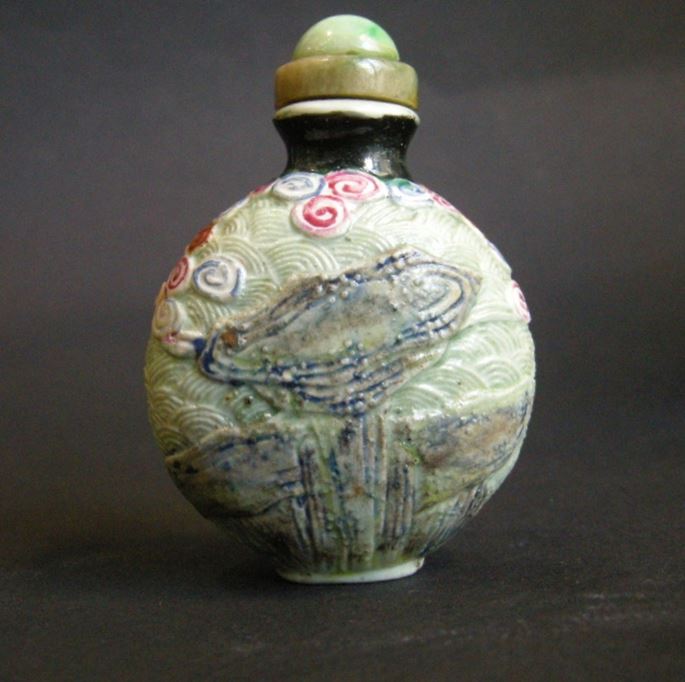 Rare porcelain snuff bottle molded  probably immortal He Xiangu | MasterArt
